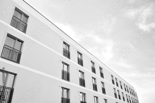 Contemporary apartment building. Generic residential architecture. Black and white.