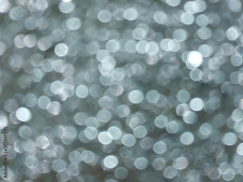 gray blurred bokeh of light for abstract background 