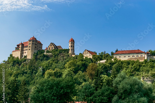 Full view of Harburg Castle from the Wörnitz riverbank. Photography taken in Harburg, Bavaria, Germany. photo