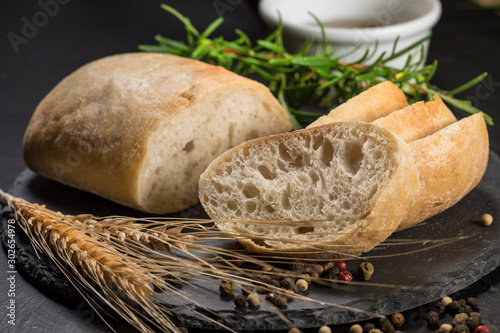 Tableau sur toile Italian ciabatta bread cut in slices.
