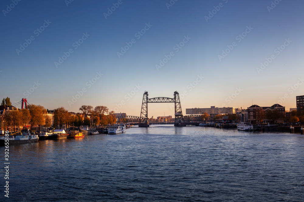 Obraz premium cityscape of Rotterdam with De Hef on the left and the Erasmus bridge on the right