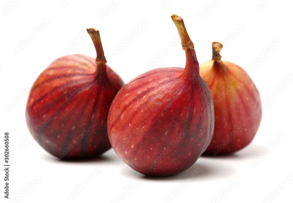 Ripe figs on a white background