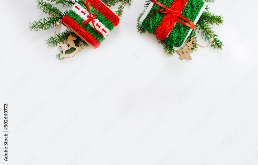Christmas gift boxes and decor in snow. Isolated on white background  - obrazy, fototapety, plakaty 