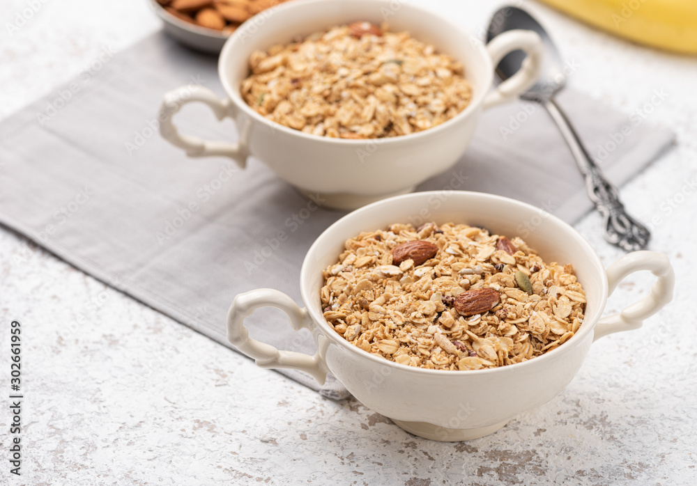 Granola, oatmeal with almond food background Granola, oatmeal with almond food background