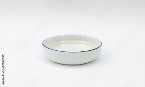 Simple white porcelain bowl with a painted blue line - cereal bowl - china ware mass product