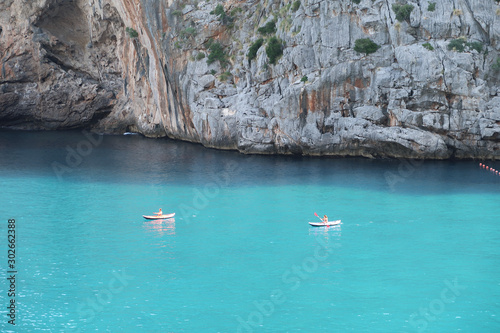 Yachts drifting in the blue sea lagoon