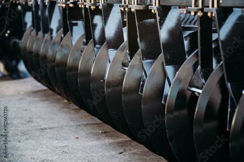Tablou pe pânză Working parts of new modern agricultural disc harrow for tillage