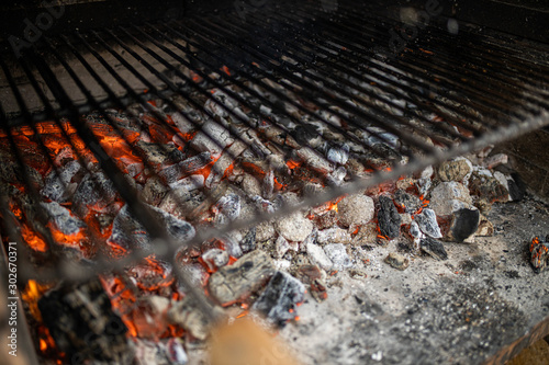burning embers on a barbecue waiting to put the meat to cook it © David Fuentes