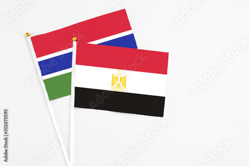 Free Download Egypt and Georgia stick flags on white background. High quality fabric, miniature national flag. Peaceful global concept.White floor for copy space. - GFXLoad