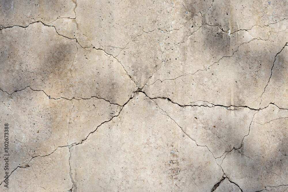 Obraz premium cracked concrete cement wall in industrial building, great for your design and texture background