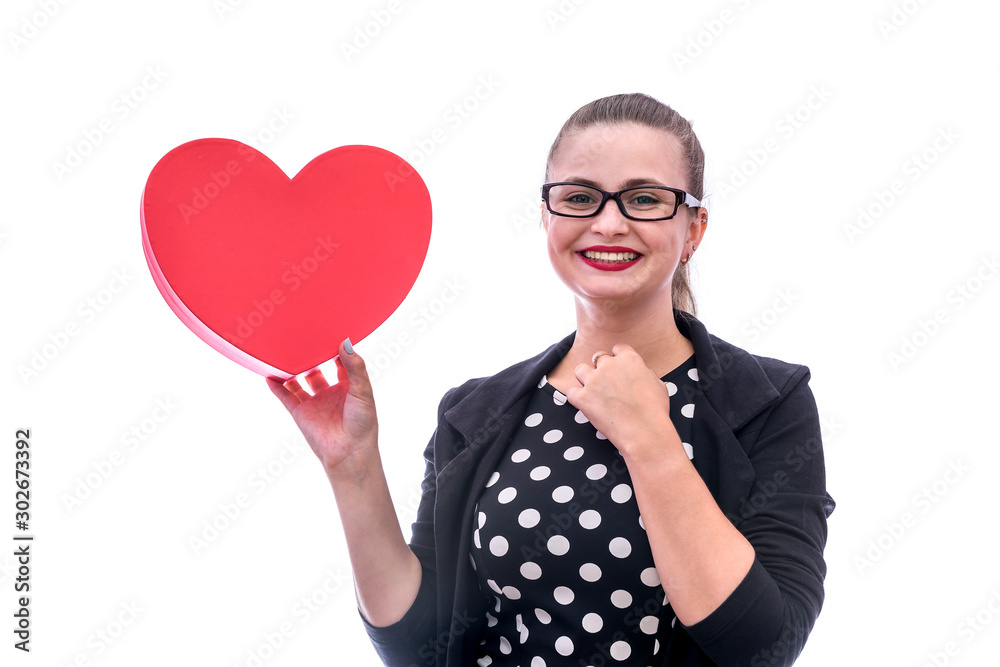 Woman holding red heart and smiling isolated on white background Woman holding red heart and smiling isolated on white background
