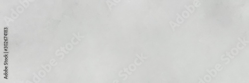 abstract painting background graphic with light gray, silver and beige colors and space for text or image. can be used as header or banner