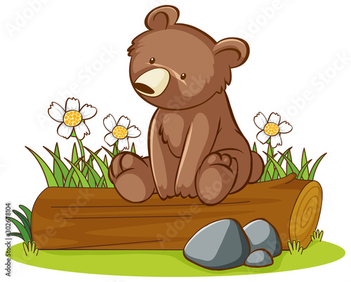 Isolated picture of grizzly bear on log