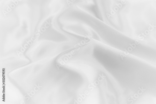 Soft focus of white color silk fabricl background texture.
