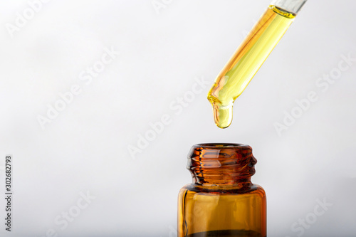 close up dropper with Cannabis CBD Oil used for medical purposes.marijuana CBD oil