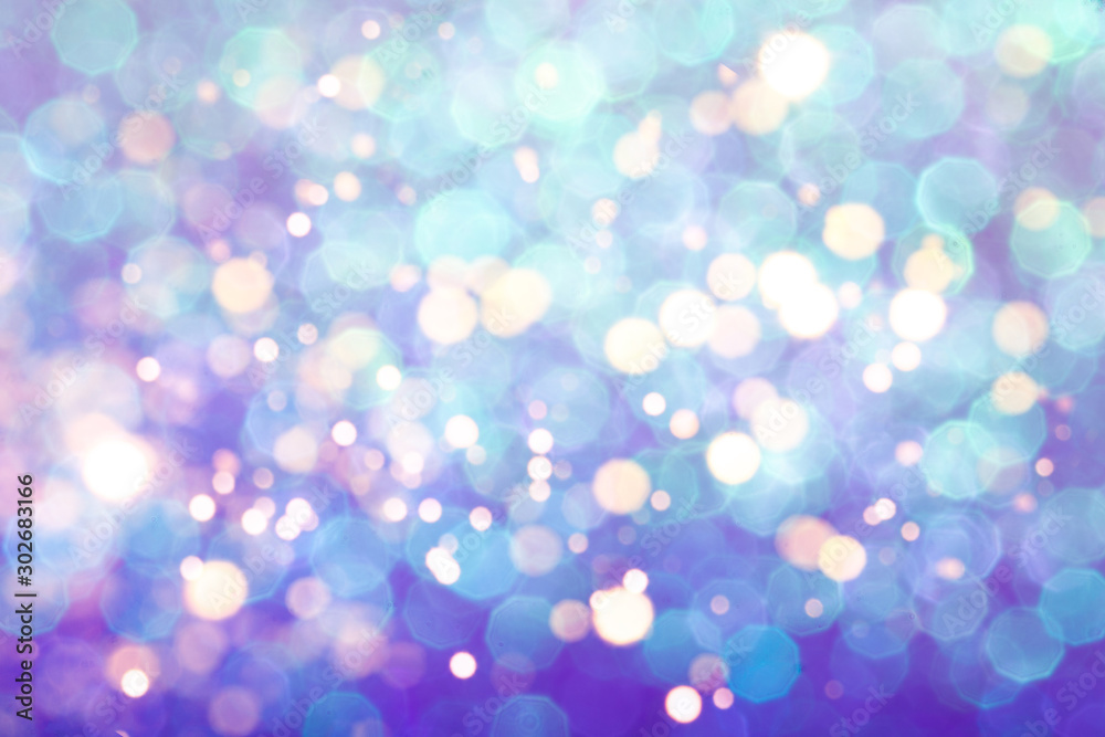 Fototapeta premium Blue festive background with sparkles in the bokeh. The concept of the celebration, the day of St. Valentine, New Year, birthdays, ceremonies, events, etc.