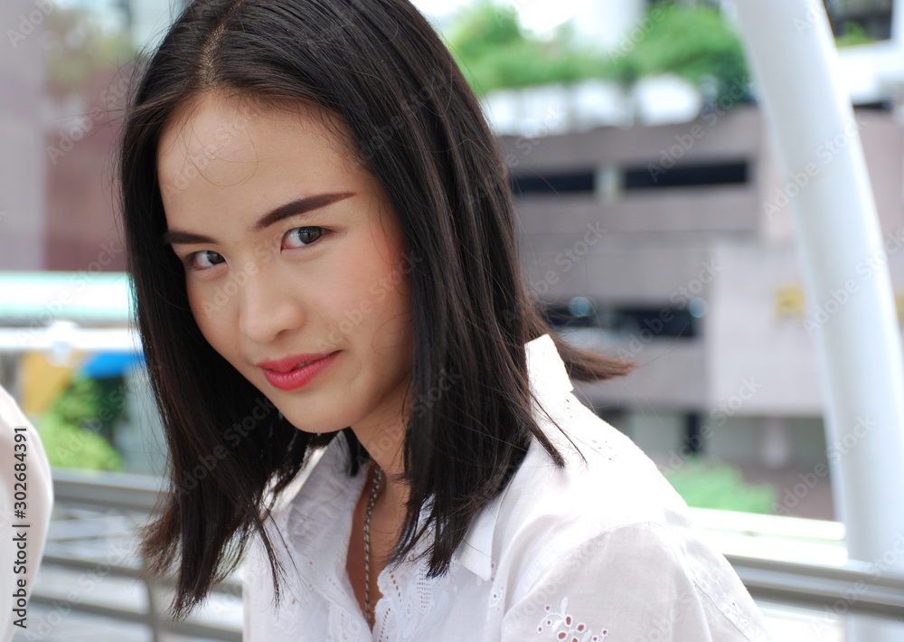 Beautiful business woman smile portrait and relaxation on walking street at outdoor.