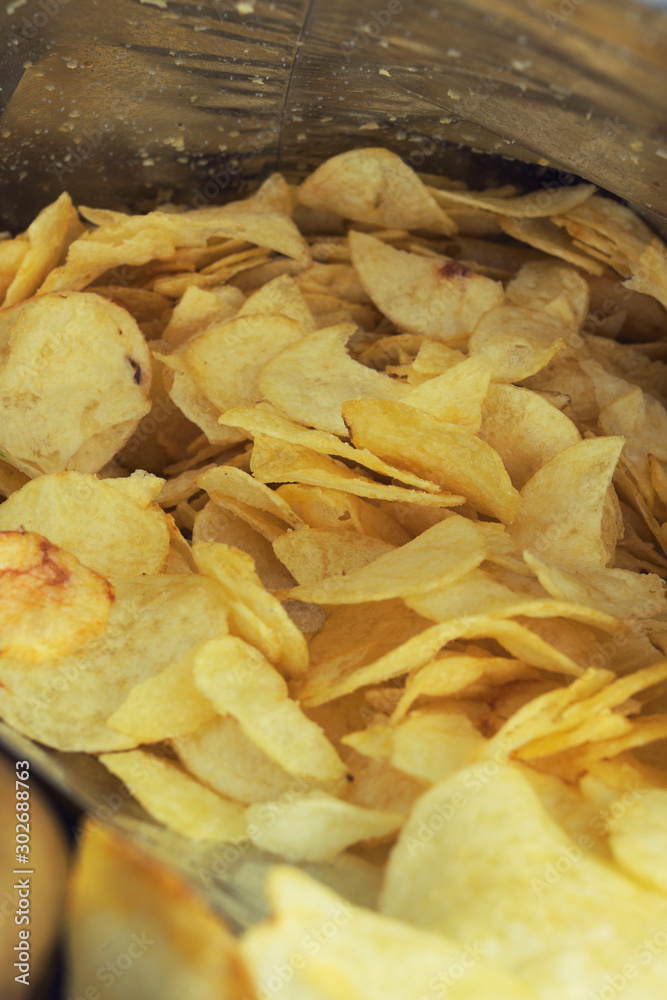 Crispy chips in the bag background Crispy chips in the bag background