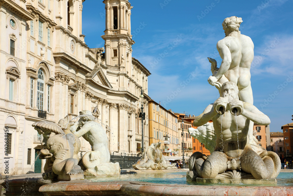 La Fontana del Moro or Moor Fountain at Piazza Navona square in Rome on a beautiful summer day, Rome, Italy.