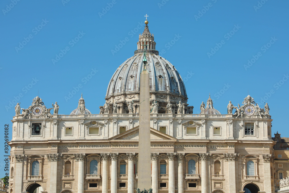 St. Peter Basilica with the dome and the Egyptian obelisk in Rome, Italy.