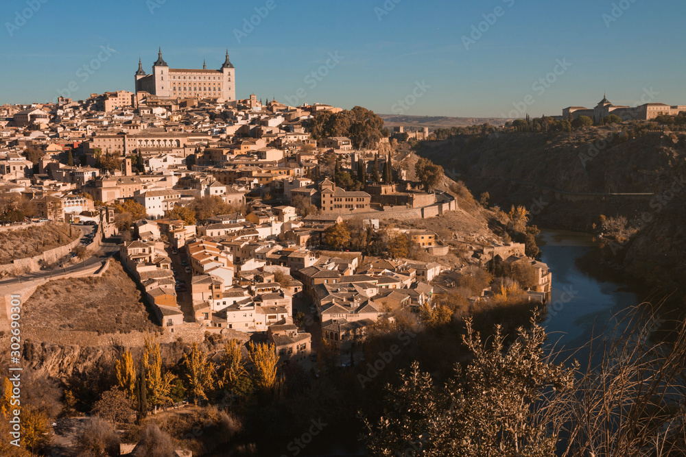 Beautiful hillside city in Spain, surrounded by a river.
