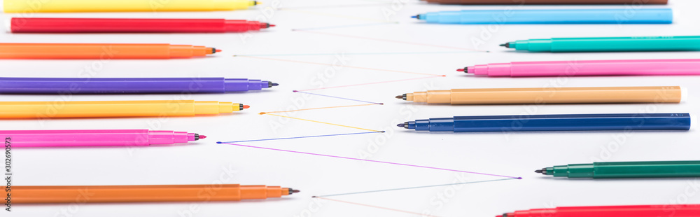 selective focus of colorful felt-tip pens on white background with connected drawn lines, connection and communication concept selective focus of colorful felt-tip pens on white background with connected drawn lines, connection and communication concept