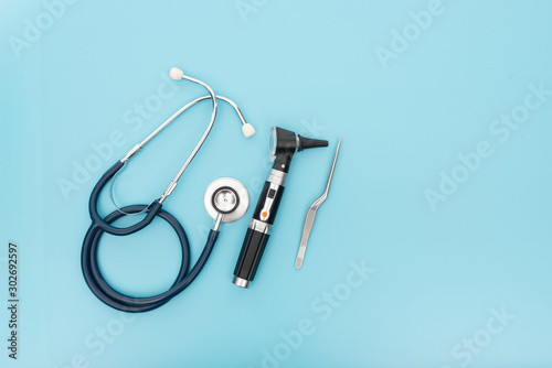 The otoscope is a device used in the ear, throat, and nose. photo