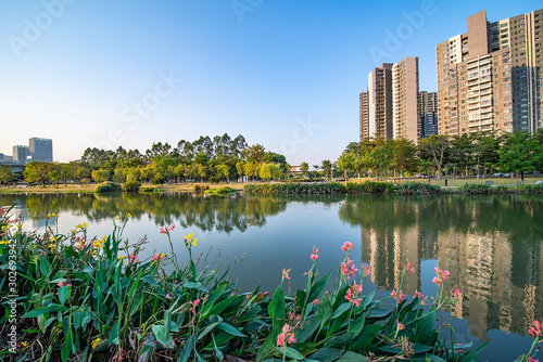 Beautiful riverside waterfront high-rise residential community environment background material