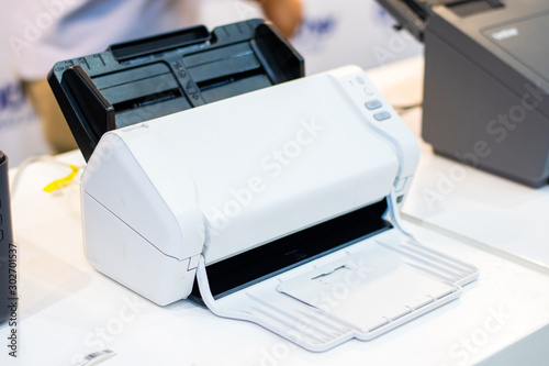 The printer placed on the table.