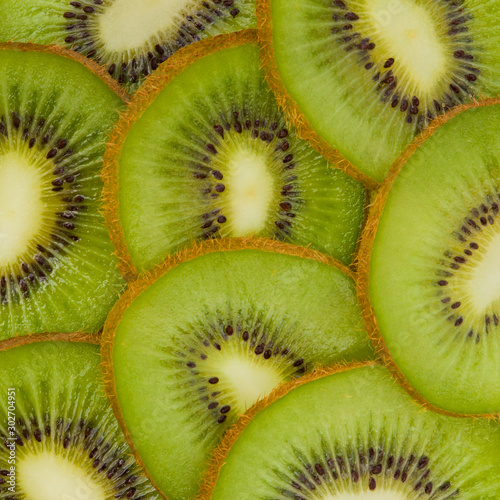  Kiwi slices closeup as background