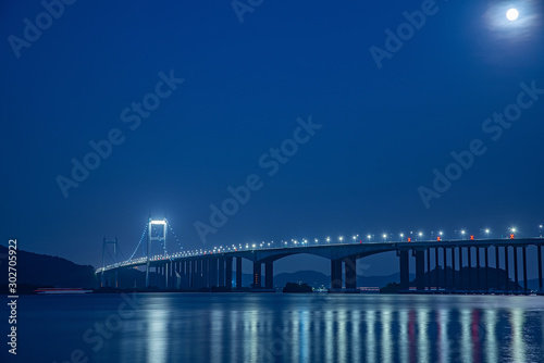 Night view of Humen Bridge on the sea in Zhujiangkou, Guangdong Province, China