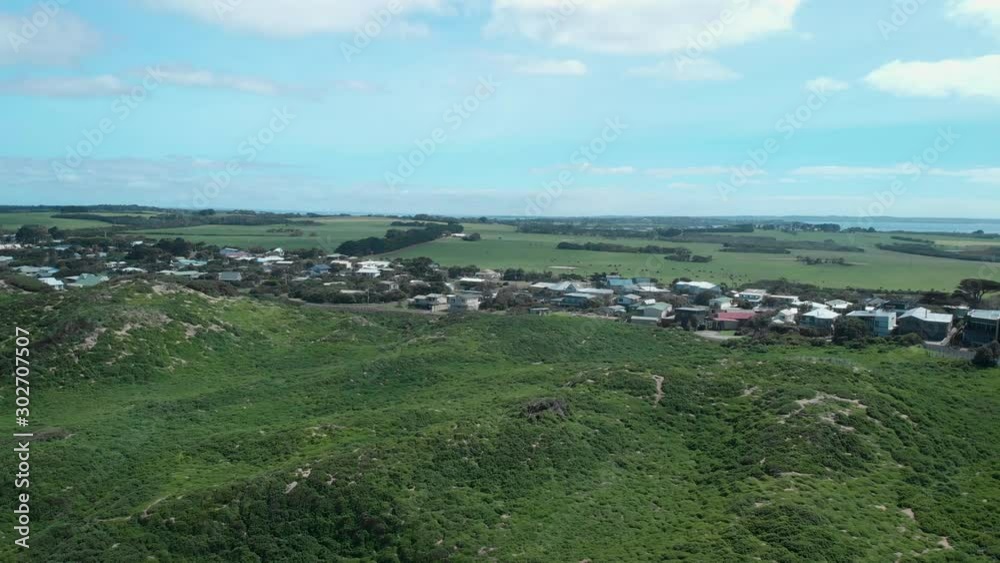 Coasta village in green grasslands and bush covered dunes Coasta village in green grasslands and bush covered dunes