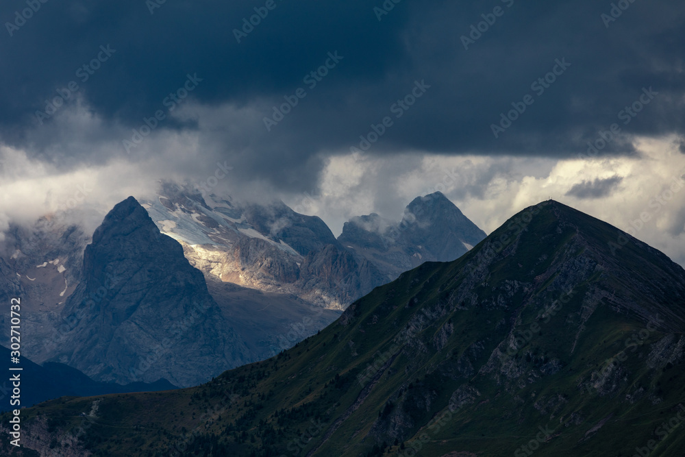 Clouds over the mountains. Mountain alpine landscape. Dolomites, Italy Clouds over the mountains. Mountain alpine landscape. Dolomites, Italy