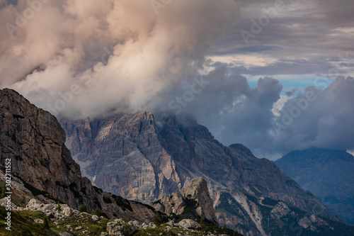 Clouds over the mountains. Mountain alpine landscape. Dolomites, Italy