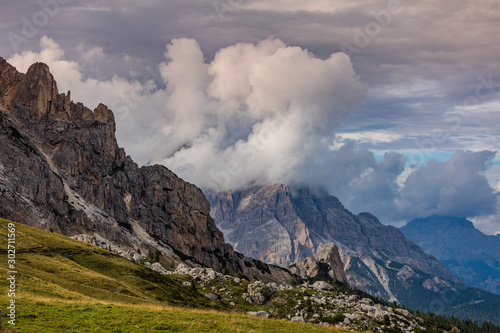 Clouds over the mountains. Mountain alpine landscape. Dolomites, Italy