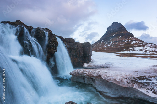 Famous mountain with waterfalls in Iceland, aurora borealis, night, kirkjufell, winter in Iceland, ice and snow, reflections, yellow grass, nature, icelandic famous landscape