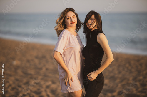 two beautiful young girls on the beach