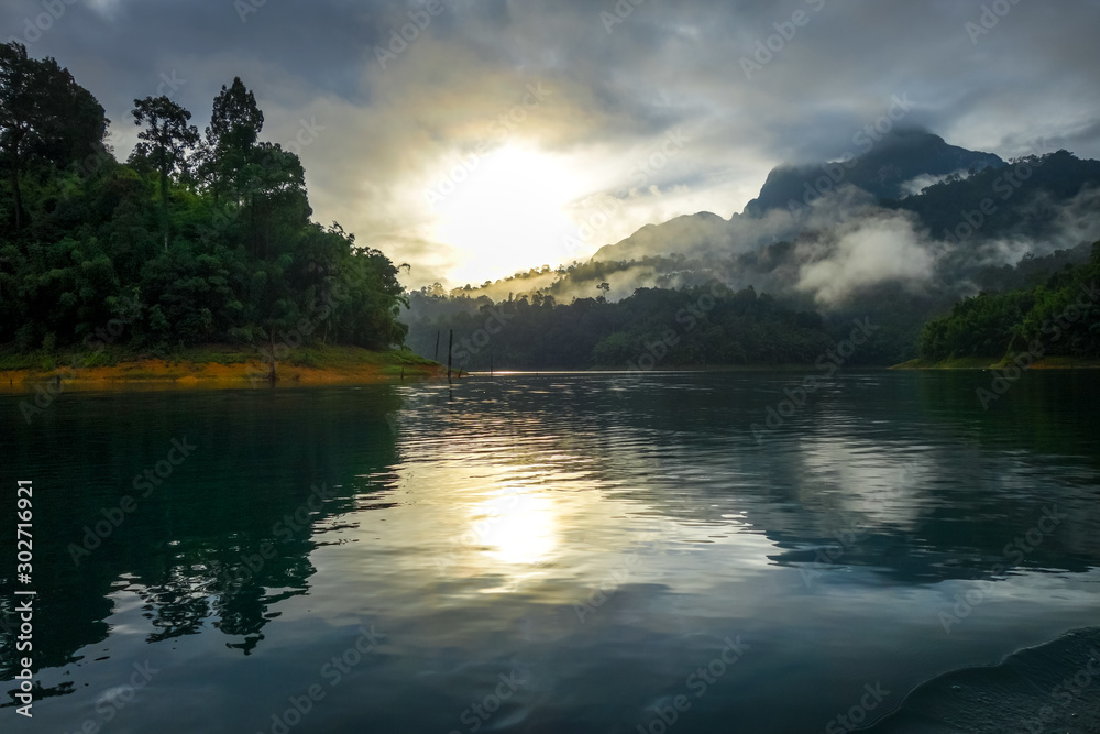 Sunrise on Cheow Lan Lake, Khao Sok National Park, Thailand Sunrise on Cheow Lan Lake, Khao Sok National Park, Thailand
