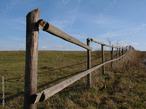 Dividing fence between two landowners in a mountainous area.