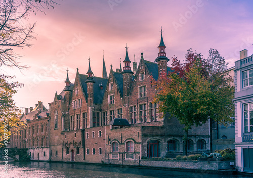Old buildings on canal in Brugges  Belgium.