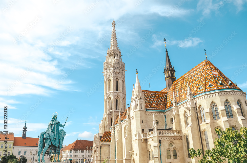 Matthias Church, or the Church of the Assumption of the Buda Castle, in Budapest, Hungary. Amazing Gothic Cathedral in the Hungarian capital city. Tourist attraction and historical heritage Matthias Church, or the Church of the Assumption of the Buda Castle, in Budapest, Hungary. Amazing Gothic Cathedral in the Hungarian capital city. Tourist attraction and historical heritage