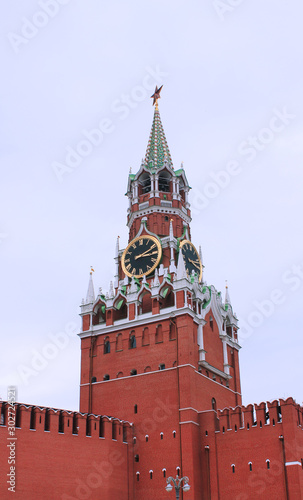 Spasskaya Tower of the Kremlin on the Red Square in Moscow, Russia on cloudy day 