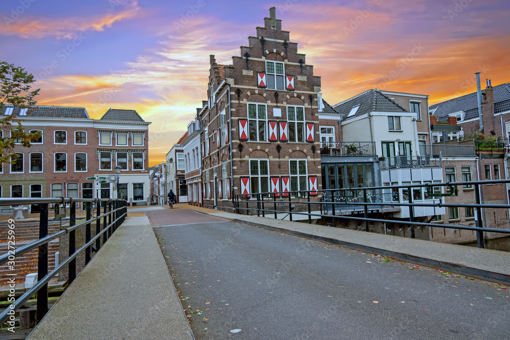 Naklejka premium City scenic from the medieval town Gorinchem in the Netherlands at sunset