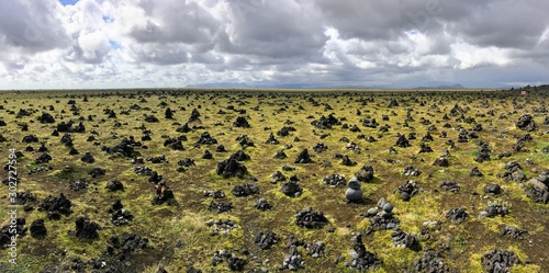 Unreal Icelandic landscape with stacked stones