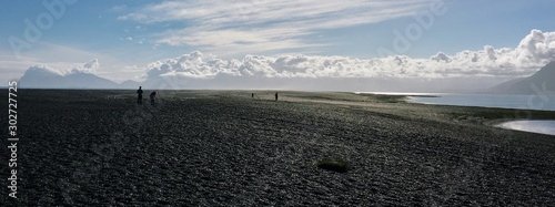 Unreal landscape with people figures 