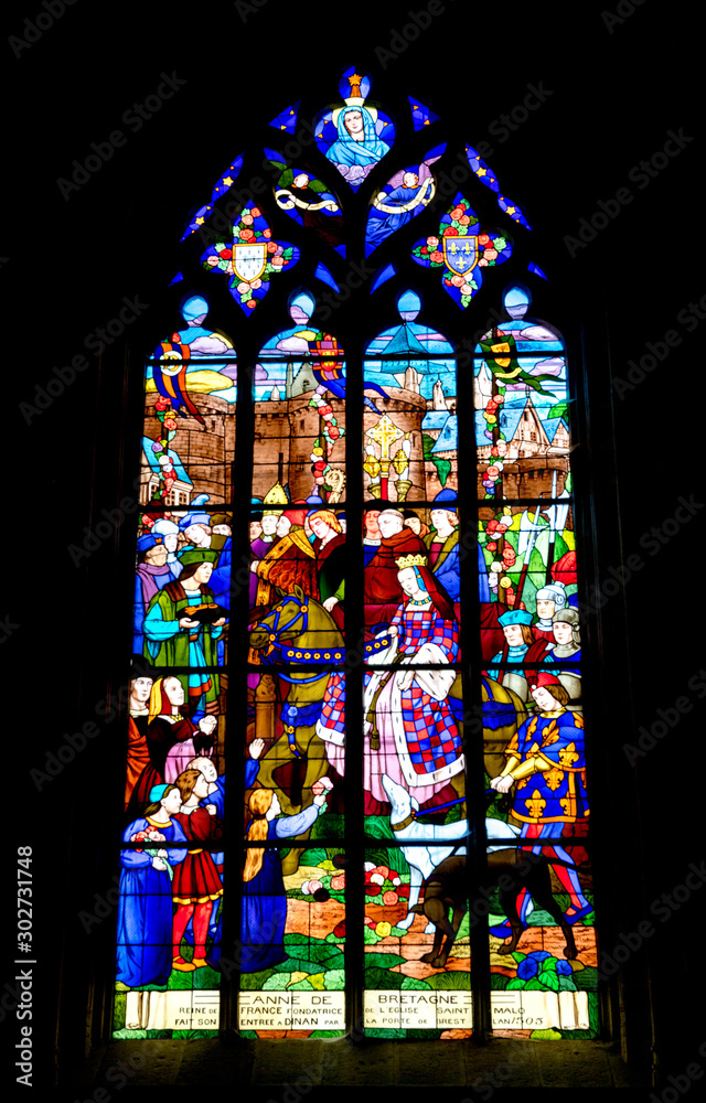 a detailed view of a stained glass window in the Basilica de Saint Malo Church in Dinan in Brittany