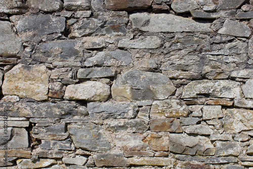 old stone wall of stones old stone wall of stones