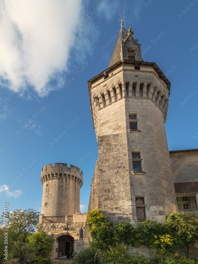 Medieval Castle towers against blue sky