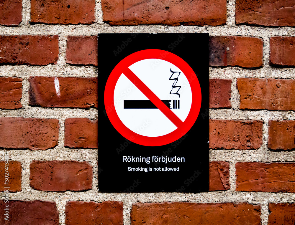 No smoking sign on the street. No smoking sign on the street.