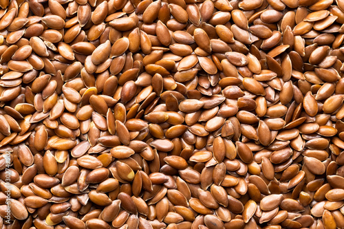 Bild auf Leinwand A group of raw flaxseeds